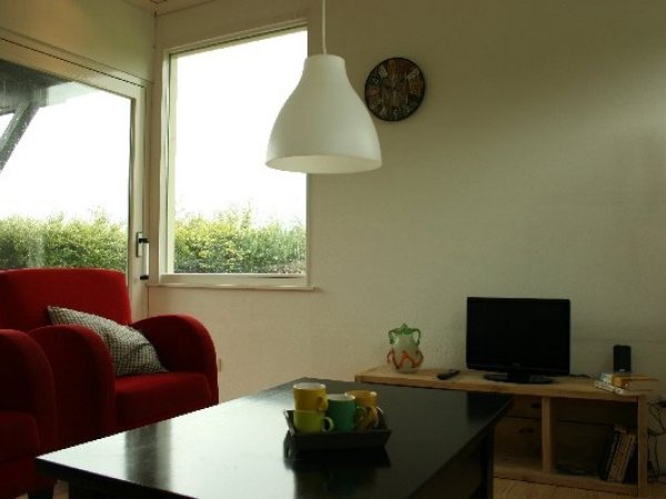 woonkamer, schuifpui naar overdekt terras